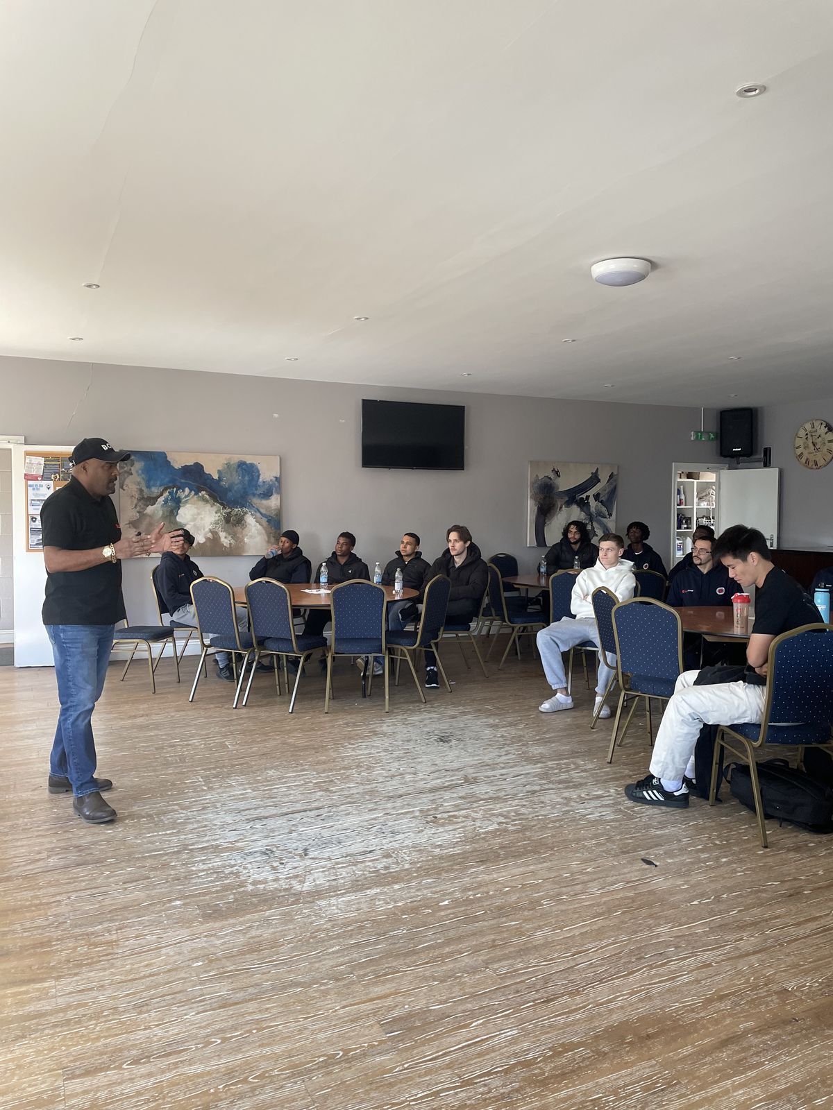 Players listening to Red Card education session